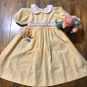 Yellow Easter dress with embroidered rabbits